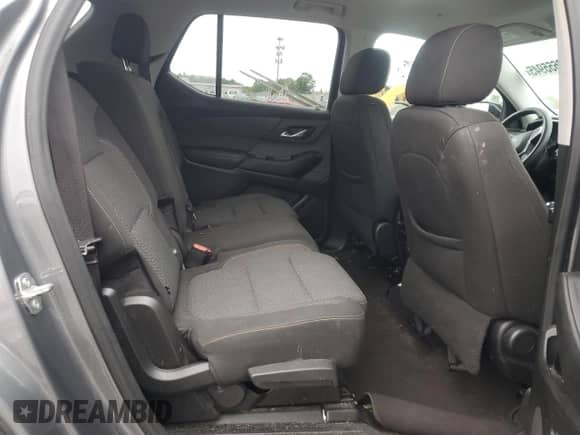 2020 Chevrolet Traverse LS z VIN 1GNERFKW7LJ311558, wystawiony jako Copart lot #80655945 z przebiegiem 77 953 mil mil oraz Szkoda całkowita • Salvage title. Historia ofert i sprzedaży dostępna na DreamBid. Obrazek 11.