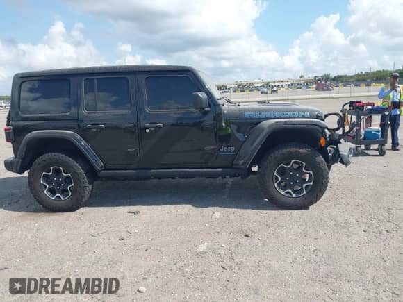 2023 Jeep Wrangler Rubicon with VIN 1C4JJXR60PW568189, listed as a IAAI auction lot 42188577 with 18,615 mi miles and . Bid and sale history available at DreamBid. Image 13.