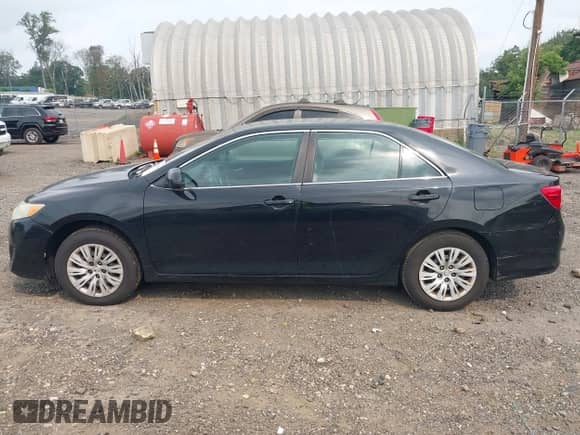 2012 Toyota Camry L z VIN 4T1BF1FKXCU606534, wystawiony jako IAAI lot #42926089 z przebiegiem 237 410 mil mil oraz . Historia ofert i sprzedaży dostępna na DreamBid. Obrazek 14.