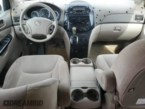 2005 Toyota Sienna CE с VIN 5TDZA23C95S231036, выставлен на аукционе Copart как лот 68925575 с пробегом 257 188 миль миль и Списание • Salvage title. История ставок и продаж доступна на DreamBid. Изображение 8.