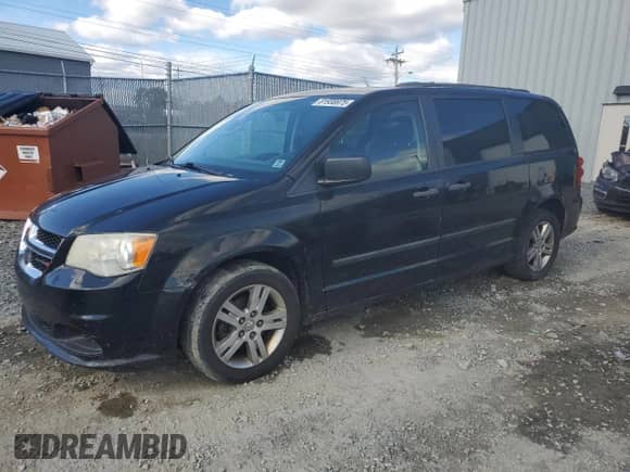2012 Dodge Grand Caravan SE z VIN 2C4RDGBG3CR422465, wystawiony jako Copart lot #81938975 z przebiegiem 214 437 mil mil oraz Czysty tytuł • Clean title. Historia ofert i sprzedaży dostępna na DreamBid. Obrazek 1.