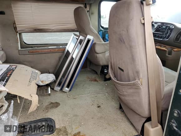 2000 Dodge Cargo Conversion z VIN 2B6HB11Y4YK164678, wystawiony jako Copart lot #49082245 z przebiegiem 211 647 mil mil oraz Szkoda całkowita • Salvage title. Historia ofert i sprzedaży dostępna na DreamBid. Obrazek 11.