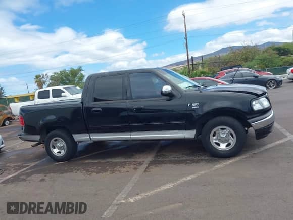 2002 Ford F-150 XLT с VIN 1FTRW07672KC06889, выставлен на аукционе IAAI как лот 42667039 с пробегом 66 463 миль миль и . История ставок и продаж доступна на DreamBid. Изображение 14.