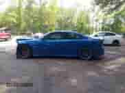 2021 Dodge Charger Scat Pack with VIN 2C3CDXGJ6MH569479, listed as a IAAI auction lot 43014340 with 36,778 mi miles and . Bid and sale history available at DreamBid. Image 14.