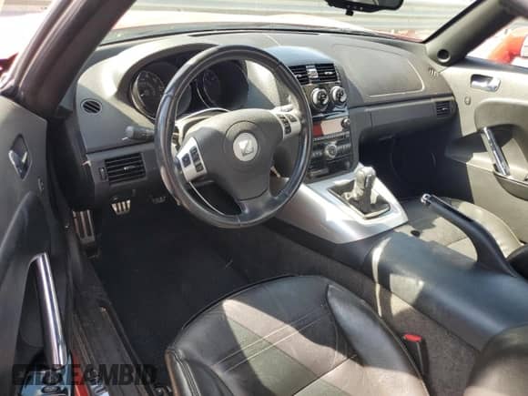 2008 Saturn Sky с VIN 1G8MB35B28Y111387, выставлен на аукционе Copart как лот 67374875 с пробегом 73 506 миль миль и Списание • Salvage title. История ставок и продаж доступна на DreamBid. Изображение 8.