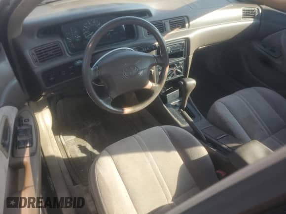 1997 Toyota Camry LE с VIN 4T1BG22K2VU770792, выставлен на аукционе Copart как лот 84550695 с пробегом 274 834 миль миль и Списание • Salvage title. История ставок и продаж доступна на DreamBid. Изображение 8.