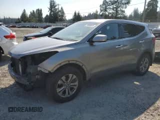 2016 Hyundai Santa Fe with VIN 5XYZTDLB9GG374517, listed as a Copart auction lot 70869645 with 63,795 mi miles and Salvage title. Bid and sale history available at DreamBid. Image 1.