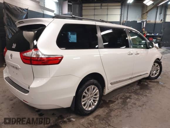 2016 Toyota Sienna XLE with VIN 5TDYK3DCXGS743128, listed as a IAAI auction lot 42448300 with 148,197 mi miles and . Bid and sale history available at DreamBid. Image 4.