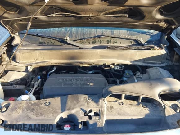 2015 Honda Pilot EX-L with VIN 5FNYF4H56FB052123, listed as a IAAI auction lot 43427901 with 197,741 mi miles and . Bid and sale history available at DreamBid. Image 10.