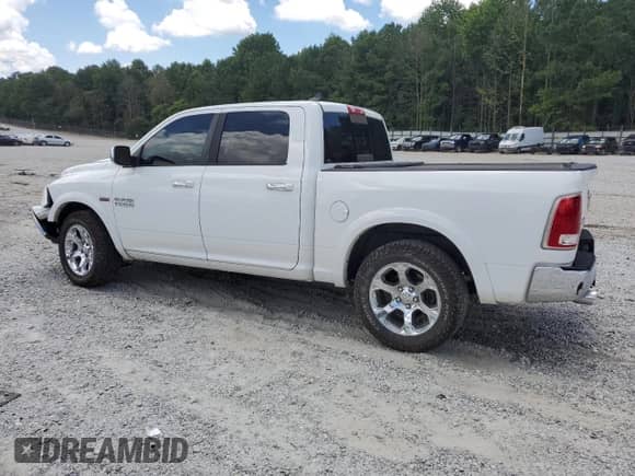 2014 Ram 1500 Laramie z VIN 1C6RR6NT7ES221844, wystawiony jako Copart lot #61636015 z przebiegiem 226 962 mil mil oraz Szkoda całkowita • Salvage title. Historia ofert i sprzedaży dostępna na DreamBid. Obrazek 2.