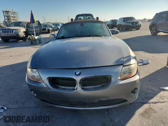 2004 BMW Z4 3.0i with VIN 4USBT53564LT25710, listed as a Copart auction lot 80996885 with 80,517 mi miles and Salvage title. Bid and sale history available at DreamBid. Image 5.