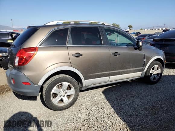 2014 Chevrolet Captiva Sport LS z VIN 3GNAL2EK4ES550360, wystawiony jako Copart lot #55183455 z przebiegiem 144 784 mil mil oraz Czysty tytuł • Clean title. Historia ofert i sprzedaży dostępna na DreamBid. Obrazek 3.