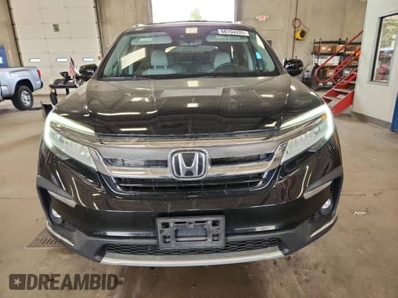 2019 Honda Pilot Touring 7-Passenger with VIN 5FNYF6H60KB008925, listed as a Copart auction lot 68154335 with 115,631 mi miles and Salvage title. Bid and sale history available at DreamBid. Image 5.