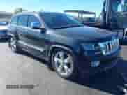 2012 Jeep Grand Cherokee Overland Summit z VIN 1C4RJFCT0CC279563, wystawiony jako IAAI lot #43536876 z przebiegiem 172 943 mil mil oraz . Historia ofert i sprzedaży dostępna na DreamBid. Obrazek 1.