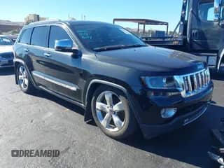 2012 Jeep Grand Cherokee Overland Summit z VIN 1C4RJFCT0CC279563, wystawiony jako IAAI lot #43536876 z przebiegiem 172 943 mil mil oraz . Historia ofert i sprzedaży dostępna na DreamBid. Obrazek 1.