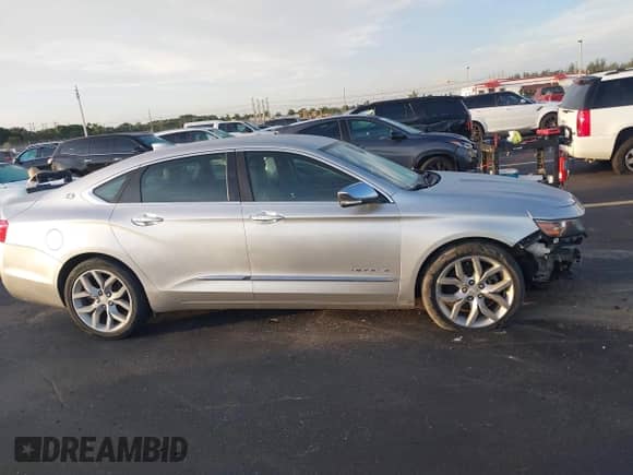 2016 Chevrolet Impala LTZ z VIN 1G1145S31GU105395, wystawiony jako IAAI lot #42924591 z przebiegiem 145 678 mil mil oraz . Historia ofert i sprzedaży dostępna na DreamBid. Obrazek 14.