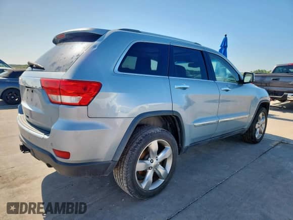 2012 Jeep Grand Cherokee Overland с VIN 1C4RJECT0CC317030, выставлен на аукционе Copart как лот 60969715 с пробегом 160 876 миль миль и Чистый • Clean title. История ставок и продаж доступна на DreamBid. Изображение 3.