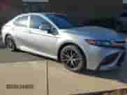 2023 Toyota Camry SE with VIN 4T1G11AK2PU789879, listed as a IAAI auction lot 43518037 with 33,044 mi miles and . Bid and sale history available at DreamBid. Image 1.