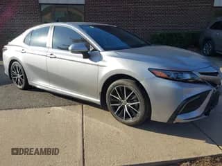 2023 Toyota Camry SE with VIN 4T1G11AK2PU789879, listed as a IAAI auction lot 43518037 with 33,044 mi miles and . Bid and sale history available at DreamBid. Image 1.