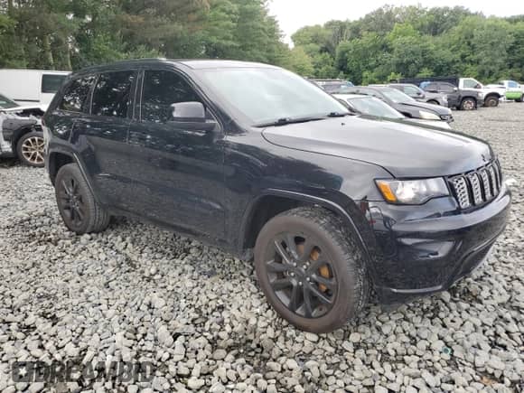 2020 Jeep Grand Cherokee Altitude with VIN 1C4RJFAG5LC159571, listed as a Copart auction lot 64872825 with 75,092 mi miles and Salvage title. Bid and sale history available at DreamBid. Image 4.