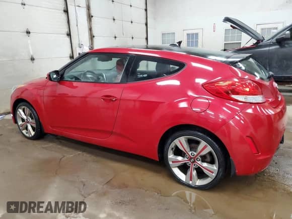 2012 Hyundai Veloster w/Black Int z VIN KMHTC6AD3CU049324, wystawiony jako Copart lot #85596195 z przebiegiem 171 178 mil mil oraz Szkoda całkowita • Salvage title. Historia ofert i sprzedaży dostępna na DreamBid. Obrazek 2.