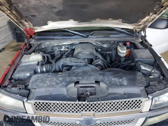 2004 Chevrolet Silverado 1500 Work Truck z VIN 1GCEK14V74Z333986, wystawiony jako Copart lot #52484895 z przebiegiem 217 978 mil mil oraz Szkoda całkowita • Salvage title. Historia ofert i sprzedaży dostępna na DreamBid. Obrazek 11.