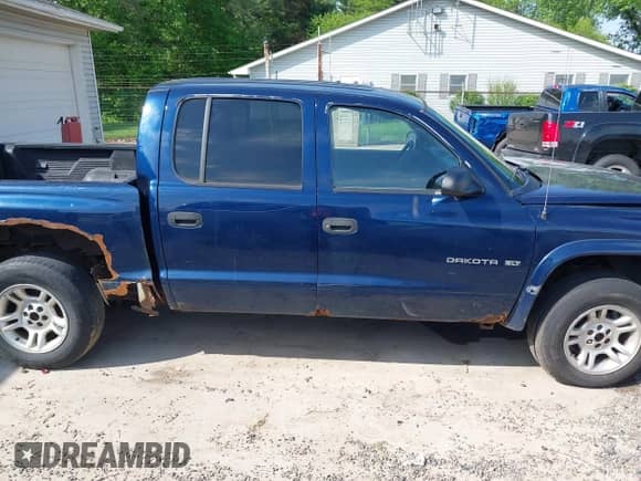 2002 Dodge Dakota SLT с VIN 1B7HG48N62S725339, выставлен на аукционе IAAI как лот 42223264 с пробегом 184 757 миль миль и . История ставок и продаж доступна на DreamBid. Изображение 14.