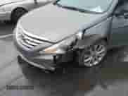 2012 Hyundai Sonata SE z VIN 5NPEC4AC1CH456058, wystawiony jako IAAI lot #43540605 z przebiegiem 134 728 mil mil oraz . Historia ofert i sprzedaży dostępna na DreamBid. Obrazek 6.