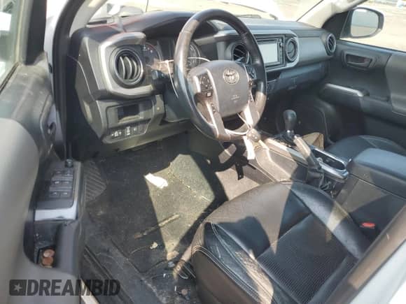 2019 Toyota Tacoma SR5 с VIN 5TFDZ5BN7KX041281, выставлен на аукционе Copart как лот 80924775 с пробегом Не указан миль и Списание • Salvage title. История ставок и продаж доступна на DreamBid. Изображение 8.