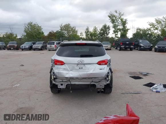 2016 Hyundai Santa Fe z VIN 5XYZWDLA1GG305495, wystawiony jako IAAI lot #43161342 z przebiegiem 121 262 mil mil oraz . Historia ofert i sprzedaży dostępna na DreamBid. Obrazek 16.