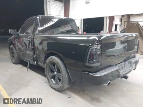 2014 Ram 1500 Express z VIN 3C6JR6AT5EG142019, wystawiony jako IAAI lot #42909966 z przebiegiem 136 943 mil mil oraz . Historia ofert i sprzedaży dostępna na DreamBid. Obrazek 3.