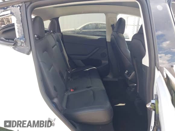 2023 Tesla Model Y Long Range with VIN 7SAYGDEE6PA078790, listed as a IAAI auction lot 43261075 with 20,370 mi miles and . Bid and sale history available at DreamBid. Image 8.