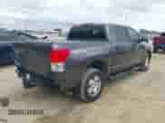 2011 Toyota Tundra with VIN 5TFEY5F15BX112122, listed as a IAAI auction lot 43322064 with 199,375 mi miles and . Bid and sale history available at DreamBid. Image 4.