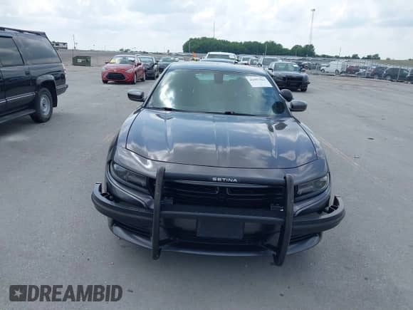 2020 Dodge Charger Police z VIN 2C3CDXKT6LH118253, wystawiony jako IAAI lot #42507562 z przebiegiem 128 786 mil mil oraz . Historia ofert i sprzedaży dostępna na DreamBid. Obrazek 12.