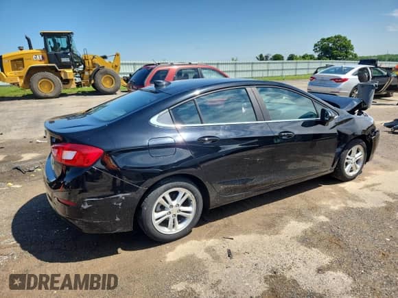 2017 Chevrolet Cruze LT с VIN 1G1BH5SE7H7251133, выставлен на аукционе Copart как лот 61690515 с пробегом 95 807 миль миль и На запчасти • Non repairable. История ставок и продаж доступна на DreamBid. Изображение 3.