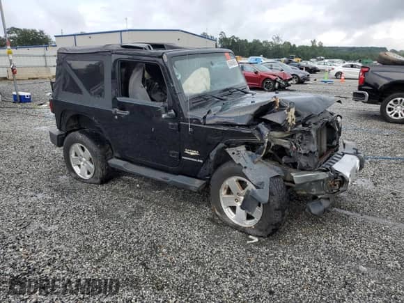 2008 Jeep Wrangler Sahara с VIN 1J4FA54158L578168, выставлен на аукционе Copart как лот 69404965 с пробегом 151 001 миль миль и Списание • Salvage title. История ставок и продаж доступна на DreamBid. Изображение 4.