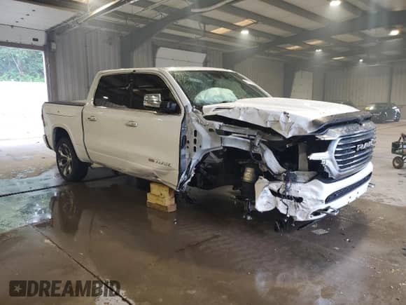 2022 Ram 1500 Longhorn with VIN 1C6SRFKT5NN102002, listed as a Copart auction lot 68815975 with 99,286 mi miles and Salvage title. Bid and sale history available at DreamBid. Image 4.