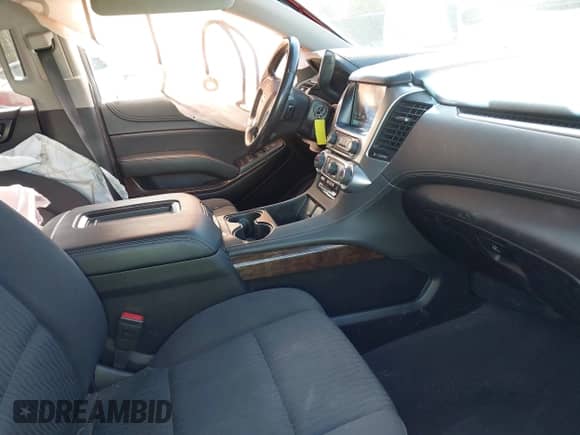 2019 Chevrolet Tahoe LS with VIN 1GNSKAKC1KR197010, listed as a IAAI auction lot 42718151 with 117,781 mi miles and . Bid and sale history available at DreamBid. Image 5.