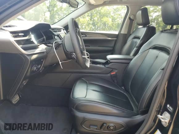 2023 Jeep Grand Cherokee with VIN 1C4RJYB66PC649332, listed as a Copart auction lot 64658955 with 34,504 mi miles and Salvage title. Bid and sale history available at DreamBid. Image 7.