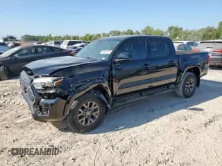 2023 Toyota Tacoma SR5 z VIN 3TMAZ5CN1PM196245, wystawiony jako Copart lot #81647875 z przebiegiem 40 103 mil mil oraz Szkoda całkowita • Salvage title. Historia ofert i sprzedaży dostępna na DreamBid. Obrazek 1.