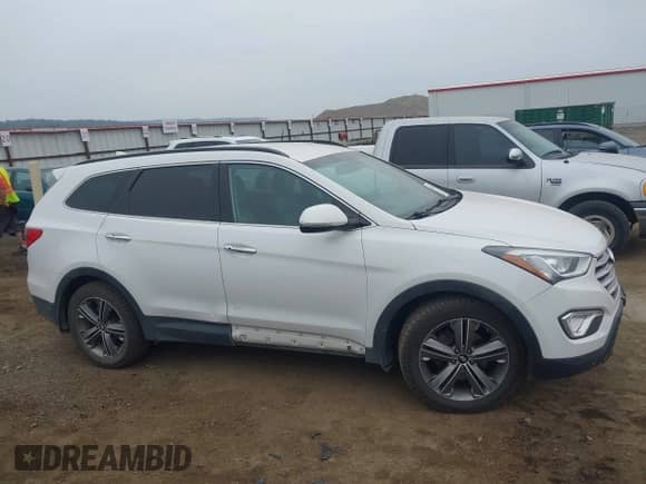 2014 Hyundai Santa Fe Limited z VIN KM8SNDHF9EU071221, wystawiony jako IAAI lot #43312415 z przebiegiem 152 481 mil mil oraz . Historia ofert i sprzedaży dostępna na DreamBid. Obrazek 13.