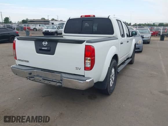 2015 Nissan Frontier SV with VIN 1N6AD0ER4FN751322, listed as a IAAI auction lot 43276518 with 124,404 mi miles and . Bid and sale history available at DreamBid. Image 4.
