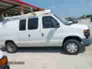 2012 Ford Econoline Cargo Commercial with VIN 1FTNE1EW0CDB13390, listed as a IAAI auction lot 42899058 with 119,855 mi miles and . Bid and sale history available at DreamBid. Image 13.