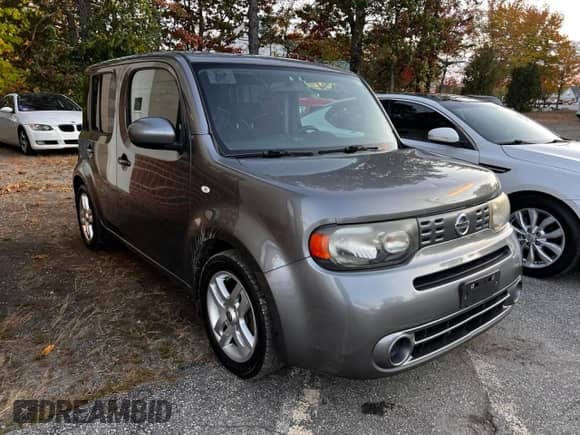 2012 Nissan Cube S с VIN JN8AZ2KR1CT250677, выставлен на аукционе Copart как лот 89621885 с пробегом 141 300 миль миль и Чистый • Clean title. История ставок и продаж доступна на DreamBid. Изображение 1.