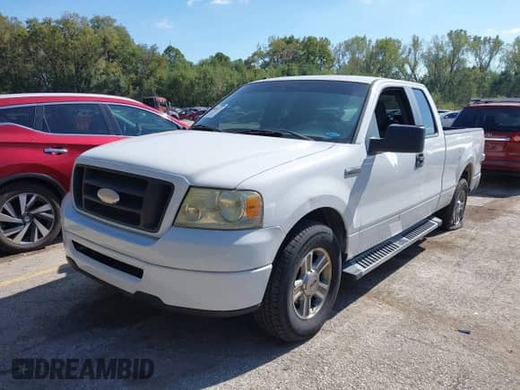 2007 Ford F-150 STX with VIN 1FTRX12W57NA78362, listed as a IAAI auction lot 43396373 with 159,816 mi miles and . Bid and sale history available at DreamBid. Image 2.