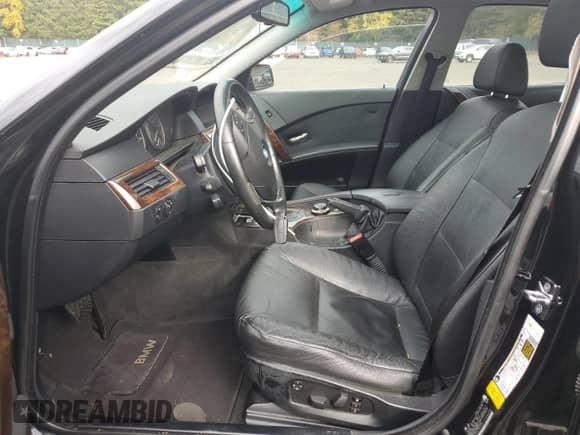 2007 BMW 5 Series 525i with VIN WBANE53577CW66306, listed as a Copart auction lot 87458205 with 175,473 mi miles and Salvage title. Bid and sale history available at DreamBid. Image 7.