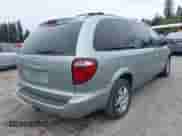2004 Dodge Caravan SXT with VIN 2D4GP44L74R575054, listed as a IAAI auction lot 42620028 with 169,465 mi miles and . Bid and sale history available at DreamBid. Image 4.
