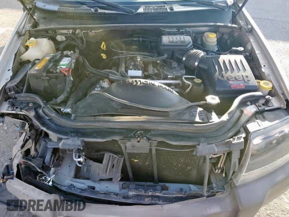 2004 Jeep Grand Cherokee Laredo with VIN 1J4GX48S94C313442, listed as a Copart auction lot 86679925 with 52,727 mi miles and Salvage title. Bid and sale history available at DreamBid. Image 12.