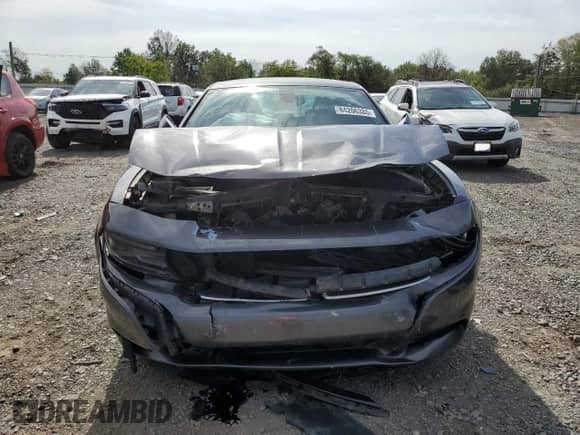 2015 Dodge Charger SE with VIN 2C3CDXBG6FH847974, listed as a Copart auction lot 84206385 with 107,282 mi miles and Salvage title. Bid and sale history available at DreamBid. Image 5.