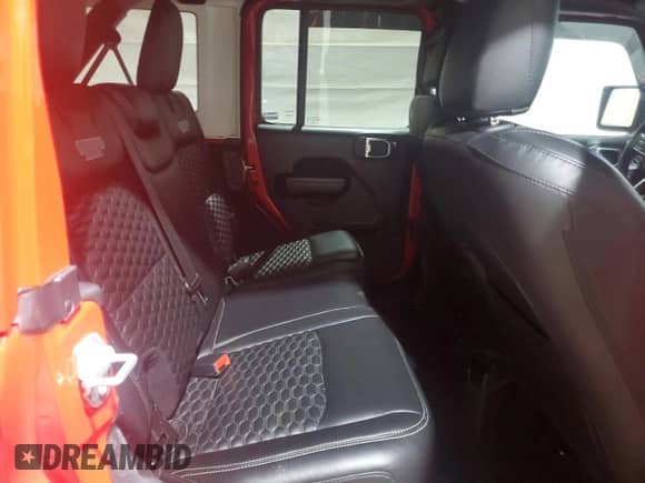 2021 Jeep Wrangler Unlimited 80th Anniversary z VIN 1C4HJXDG4MW512959, wystawiony jako Copart lot #72068575 z przebiegiem 49 015 mil mil oraz Szkoda całkowita • Salvage title. Historia ofert i sprzedaży dostępna na DreamBid. Obrazek 10.